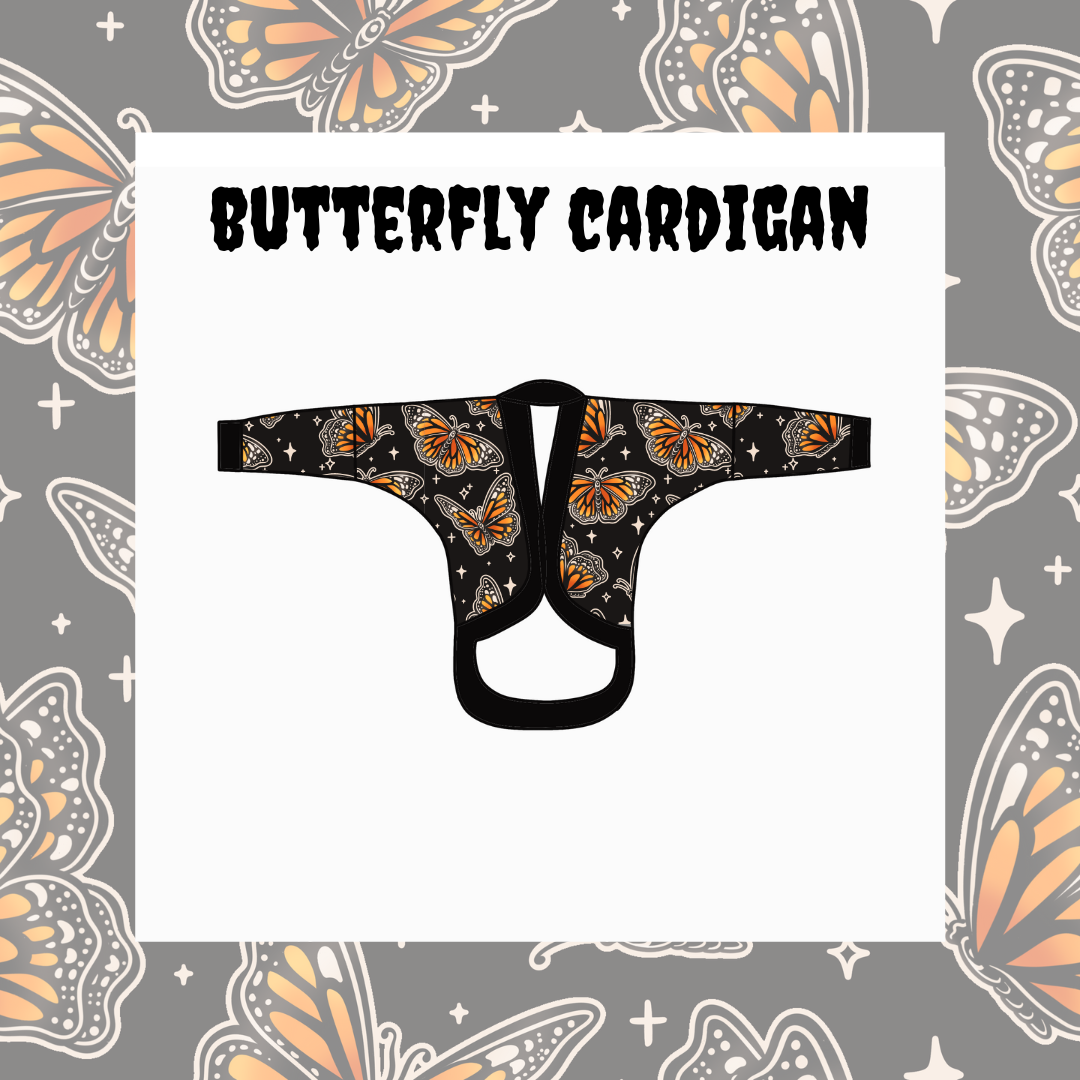 Butterfly cardigan design on a gray background with butterfly patterns.