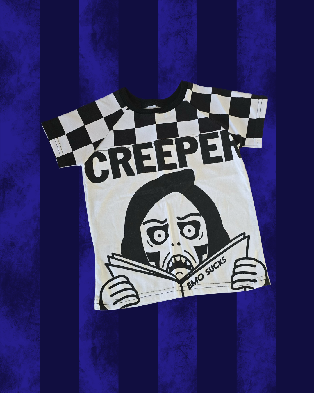 A white CREEPER t-shirt saying EMO SUCKS