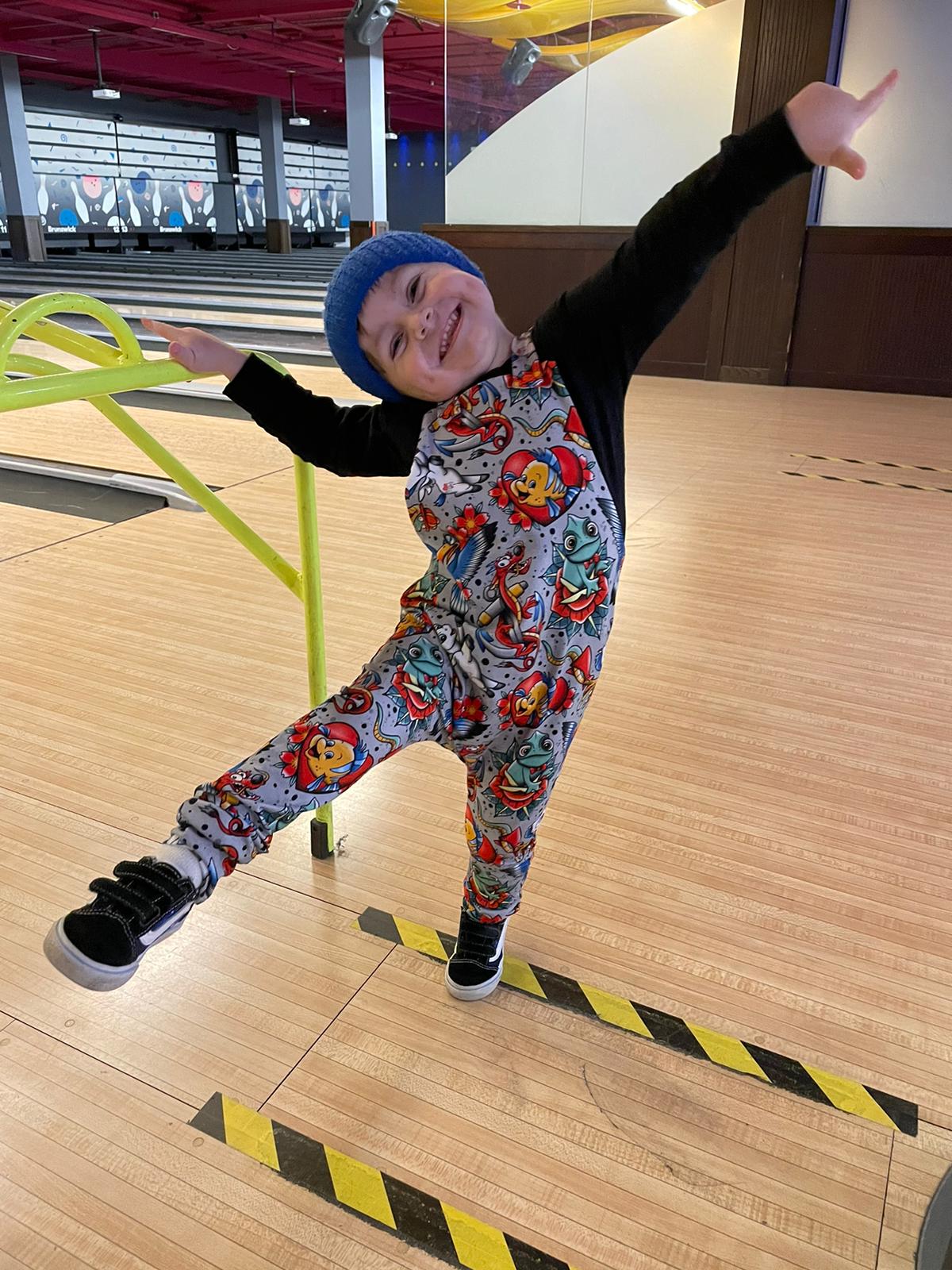 An Alt Originals customer wearing a handmade alternative dungarees