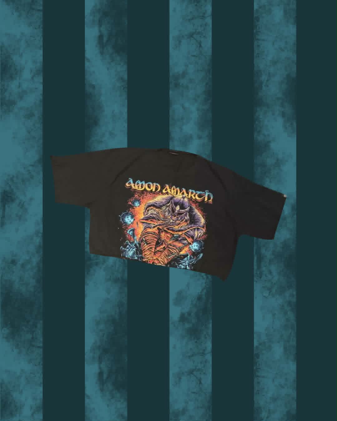 An upcycled T-shirt for the band Amon Amarth, featuring the 'Into the Void' album artwork on the front.