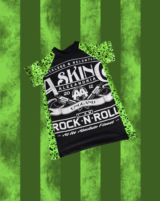 Black t-shirt with 'Asking Alexandria' design on a green striped background