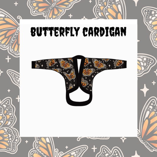 Butterfly cardigan design on a gray background with butterfly patterns.