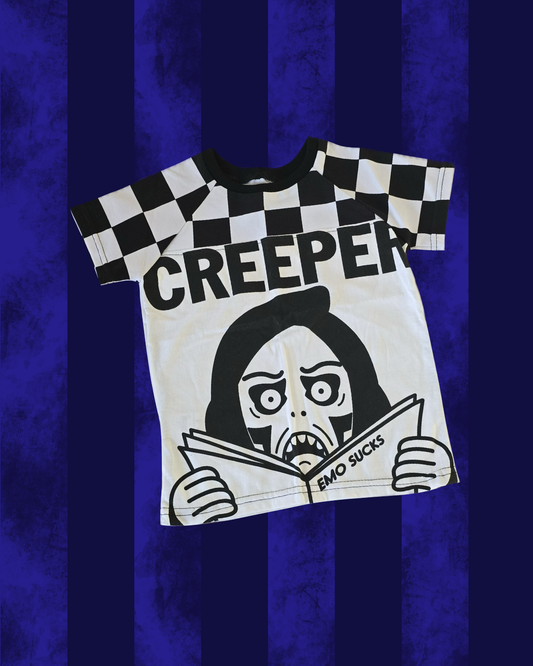 A white CREEPER t-shirt saying EMO SUCKS