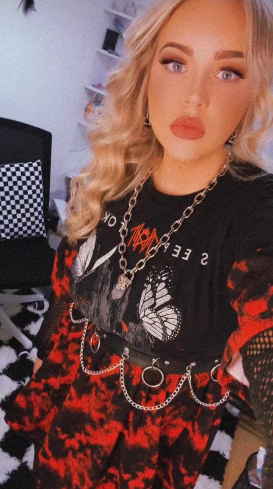 Alt Encore customer wearing an upcycled smock from a SLEEP TOKEN t-shirt