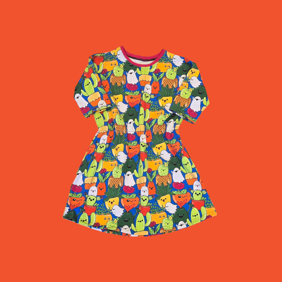 Colorful dress with plant pattern on an orange background