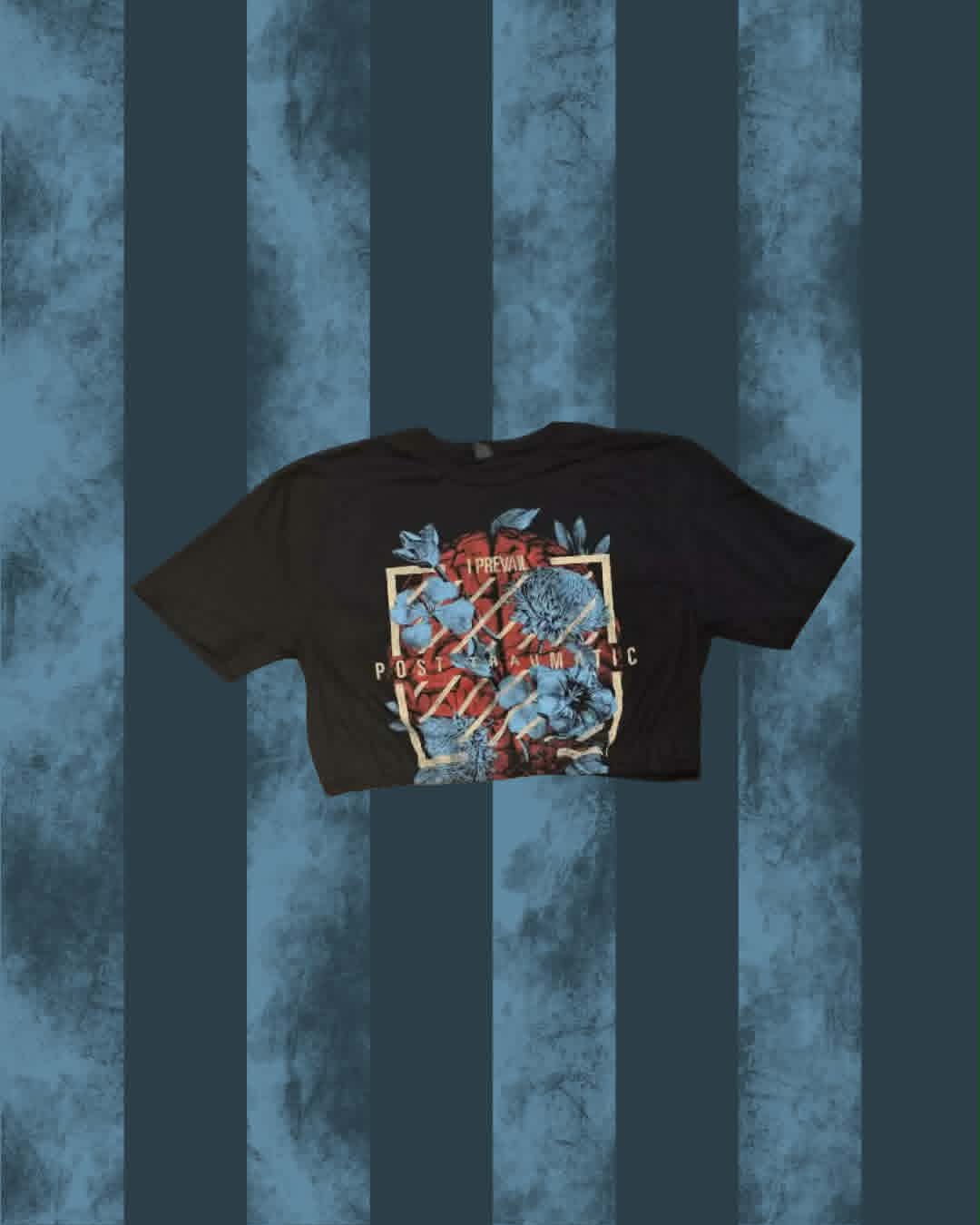 A black cropped I Prevail t-shirt featuring a colourful graphic print with blue flowers, red roses.