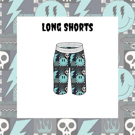 Long shorts with skull and lightning bolt pattern on a decorative background