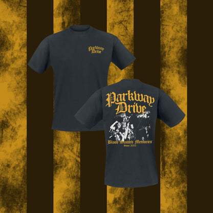 Two navy blue t-shirts with 'Parkway Drive' branding on a textured yellow and brown background.