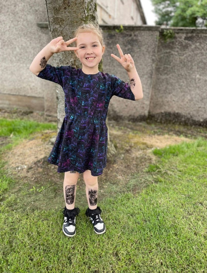 An Alt Originals customer wearing a handmade alternative playdate dress