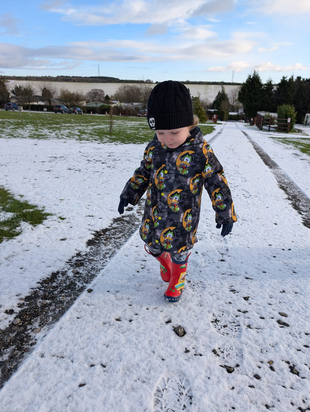 An Alt Originals customer wearing a handmade alternative rainproof coat