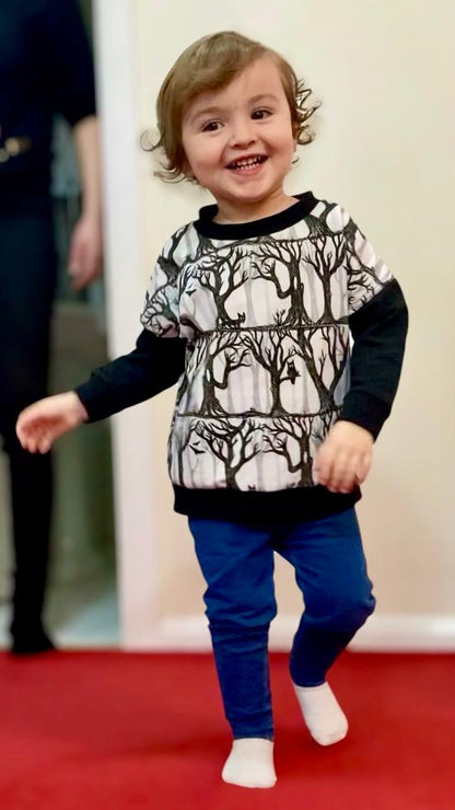 An Alt Originals customer wearing a handmade alternative skater sweater
