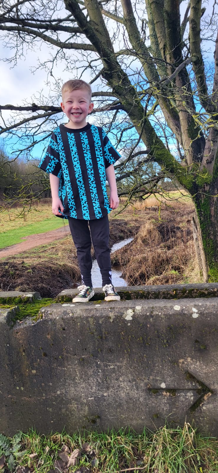 An Alt Originals customer wearing a handmade alternative skater tee