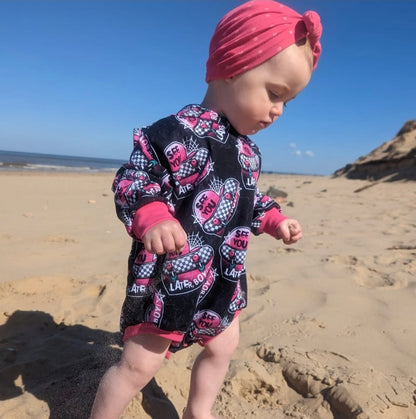 An Alt Originals customer wearing a handmade alternative sweater romper
