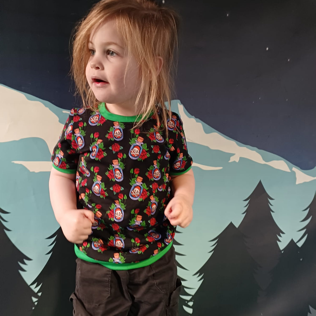 An Alt Originals customer wearing a handmade alternative sweater tee