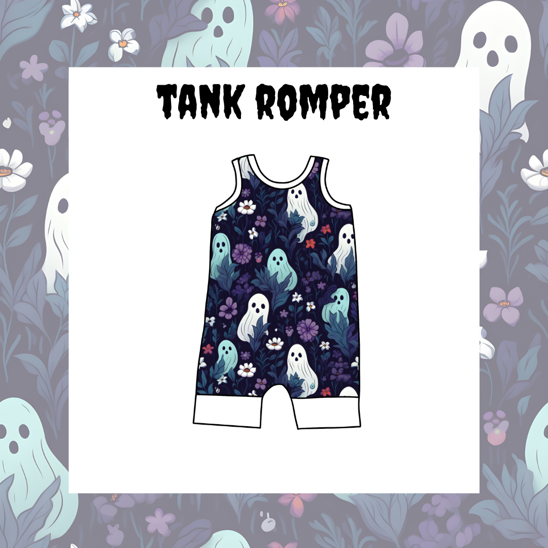 A sleeveless kids' tank romper with a floral and ghost pattern on a dark background, displayed against a patterned background with the text 'TANK ROMPER' at the top.