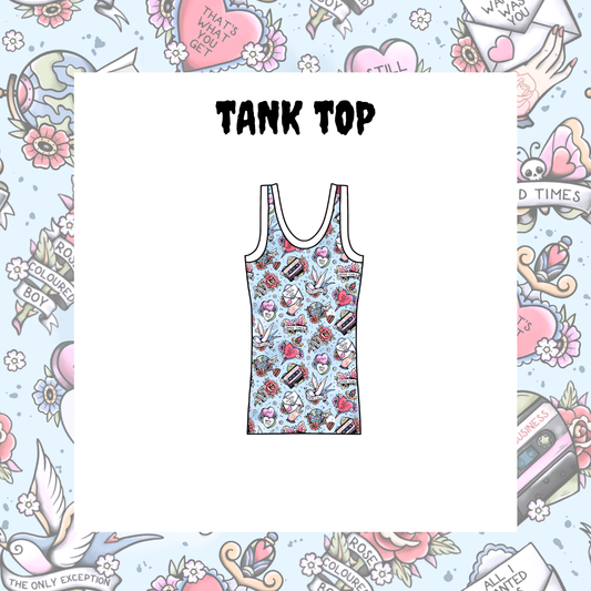 A white tank top with a colorful retro tattoo-style graphic print featuring skulls, roses, and hearts, shown on a white card centered within a decorative tattoo-themed border. The text 'TANK TOP' is printed above the garment.