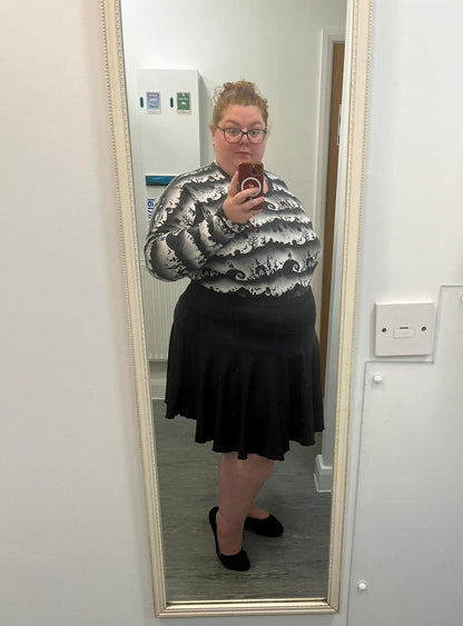 An Alt Originals customer wearing a handmade alternative women's t-shirt