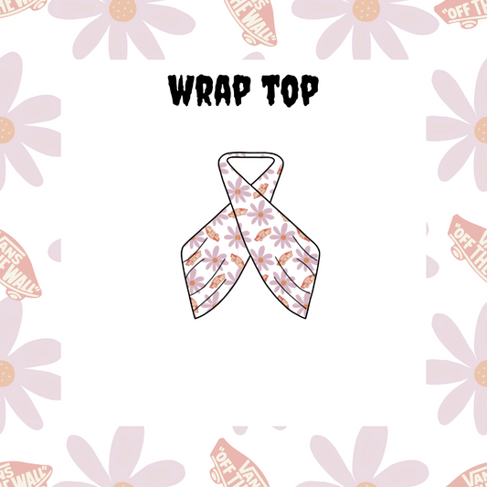 A graphic image of a wrap top with a floral pattern and a central band that reads 'WRAP TOP' against a patterned background.